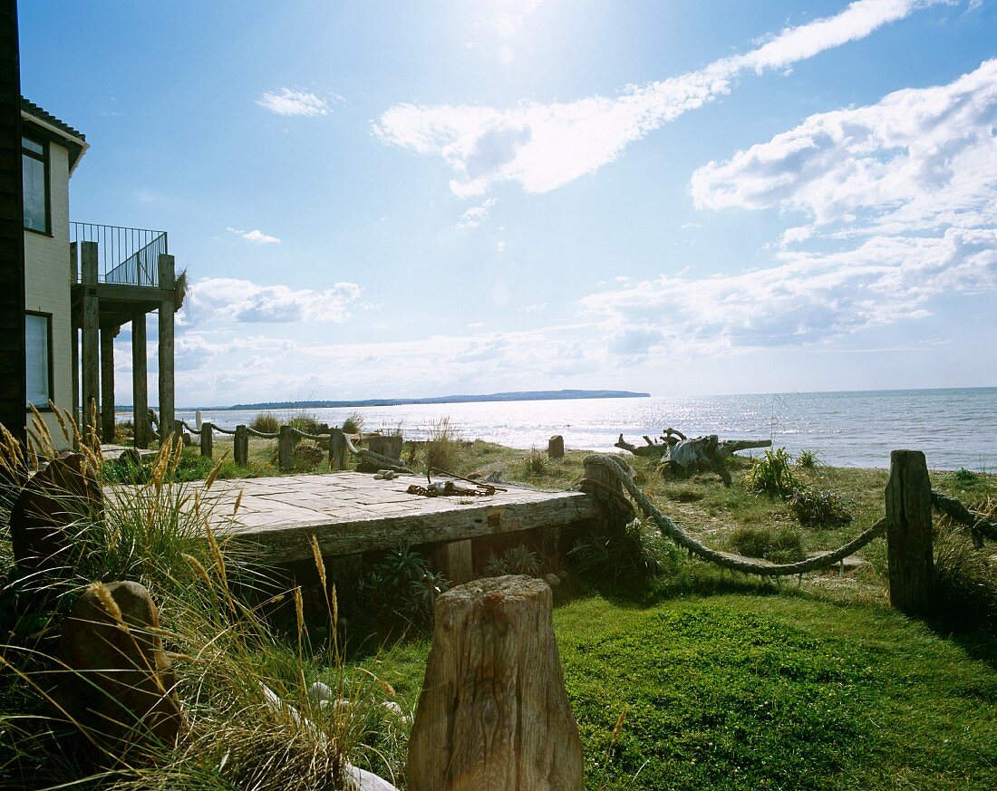 House with deck on sea shore