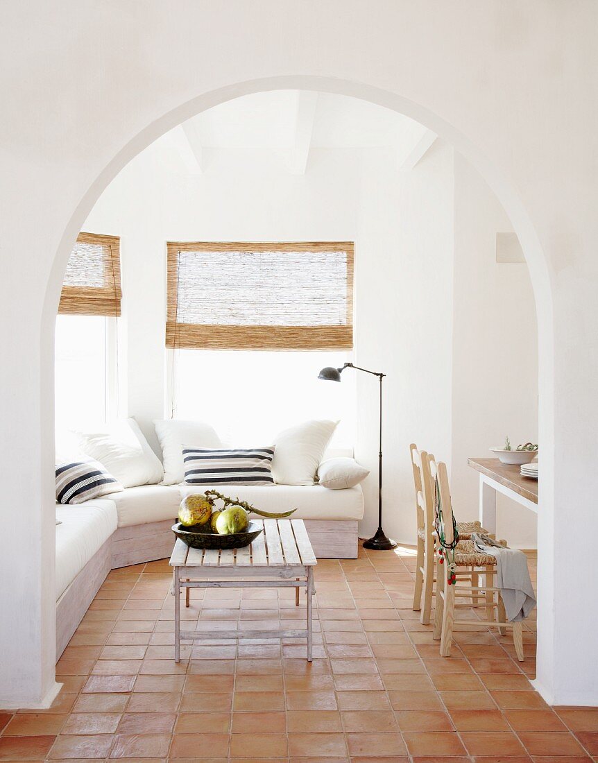 Cozy sitting area in an open, Mediterranean style living room