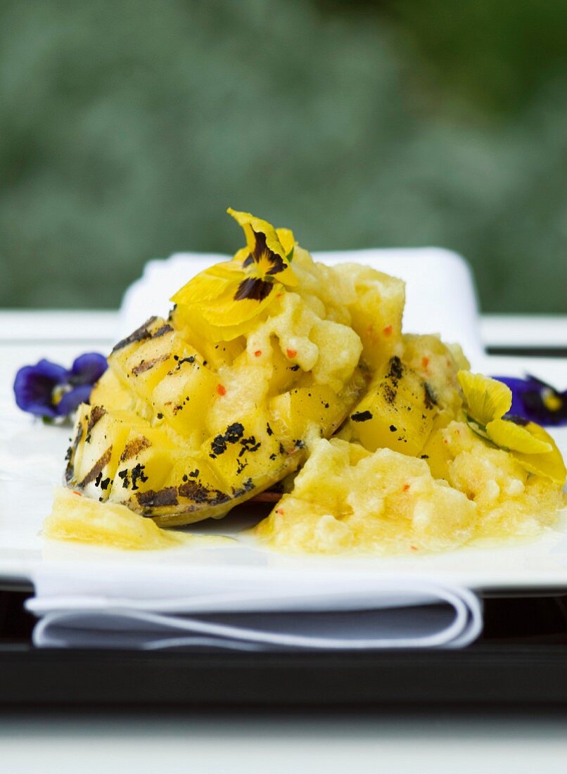 Grilled mango, served with pineapple and chilli granita