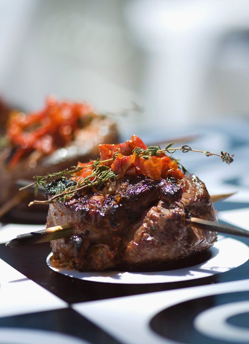 Mediterranean lamb steak served with dried tomatoes