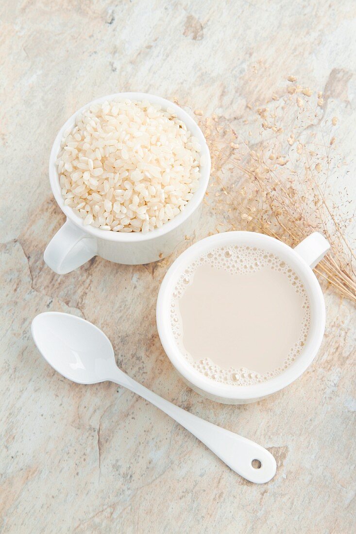 Rice milk and a cup of rice