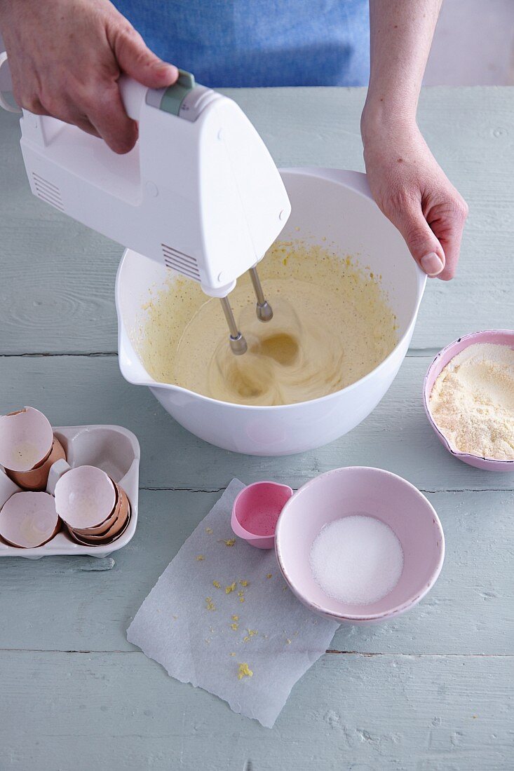 Ingredients for gluten-free sponge cake being mixed together