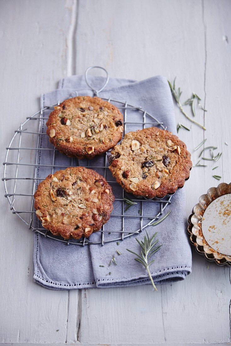 Gluten-free sour cherry cakes with nuts and rosemary