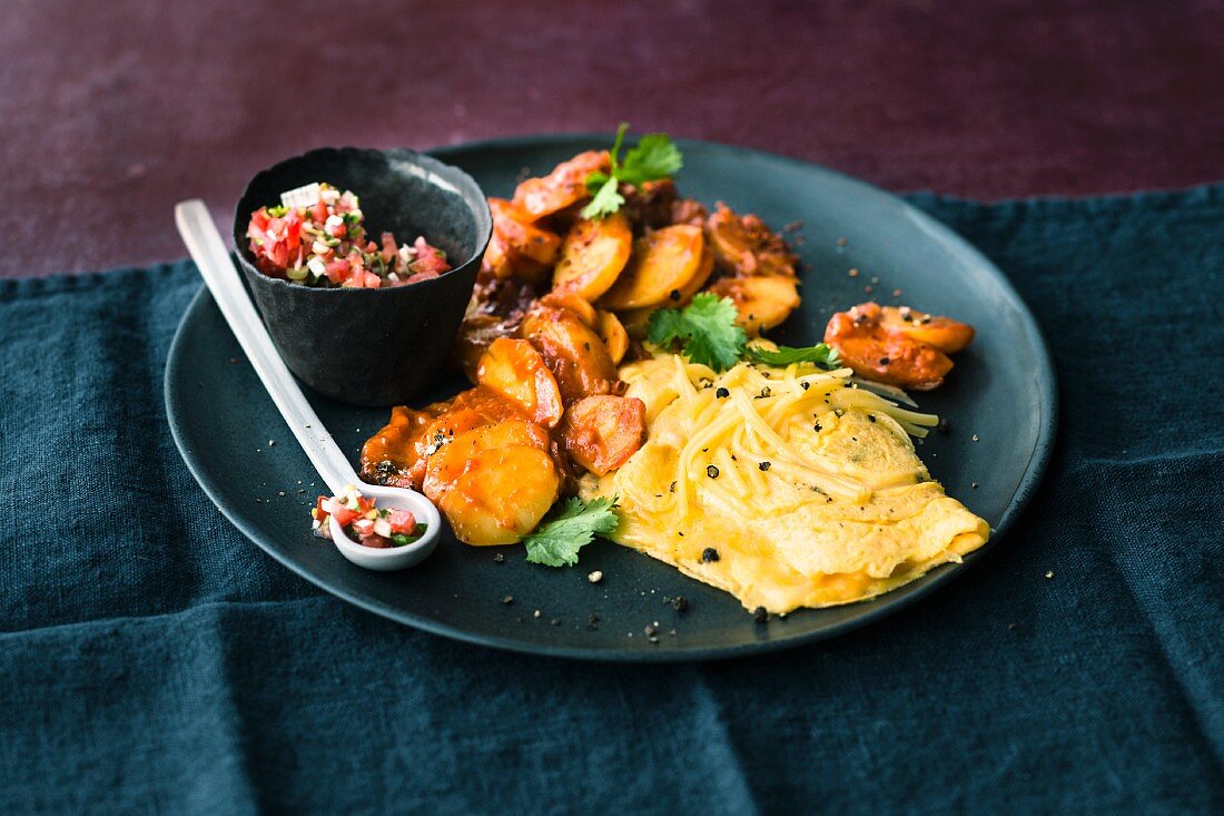 Cheese omelette with chilli and tomato potatoes