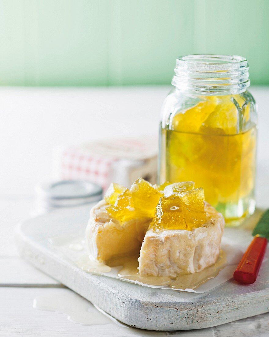 Soft cheese with yellow watermelon jam