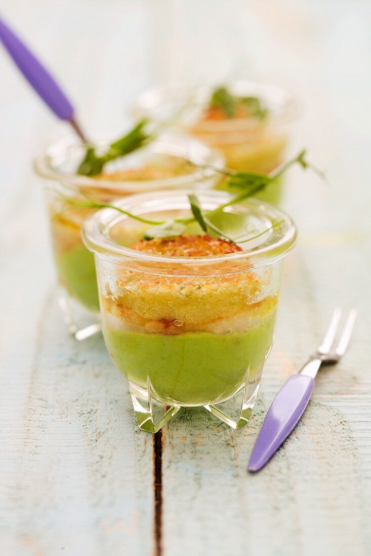 Scallop and wasabi crumble with pea and ginger purée in glasses