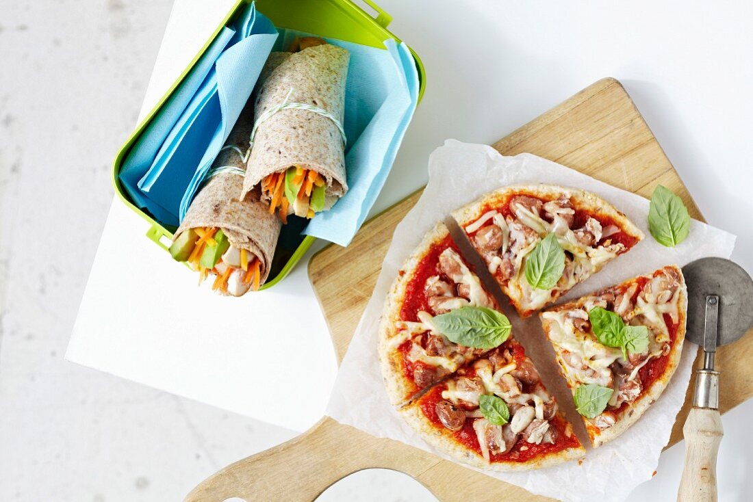 Homemade pizza and vegetable wraps