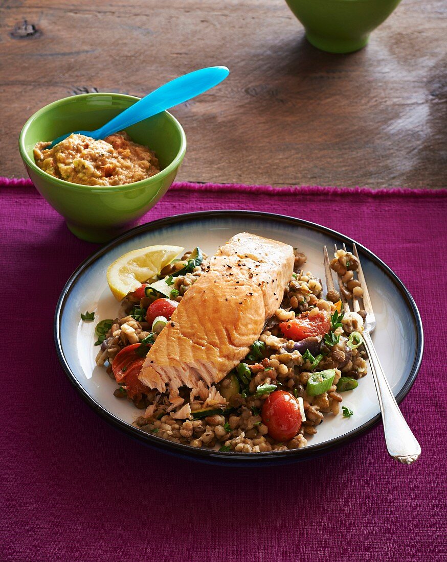 Baked salmon on a lentil medley with barley