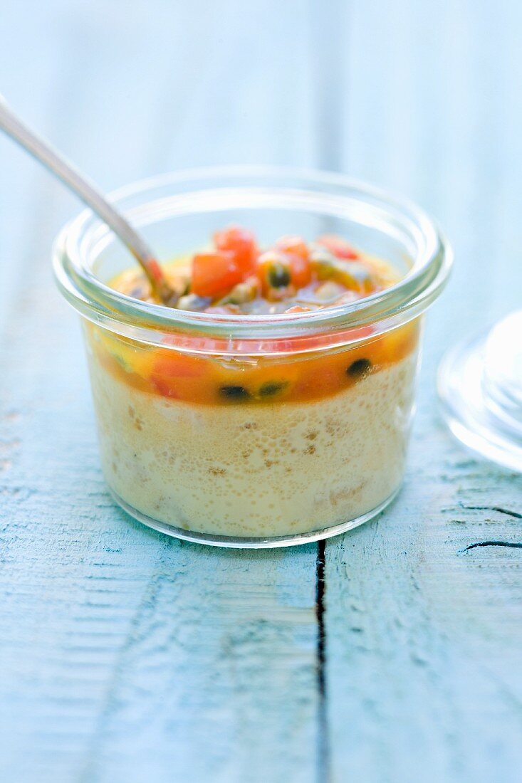 Seafood pudding with passion fruit salsa in a glass