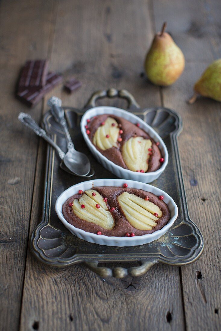 Chocolate bake with pears and pink pepper