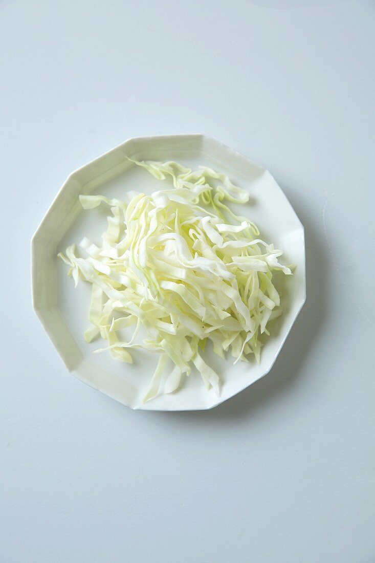 A bowl of sliced pointed cabbage