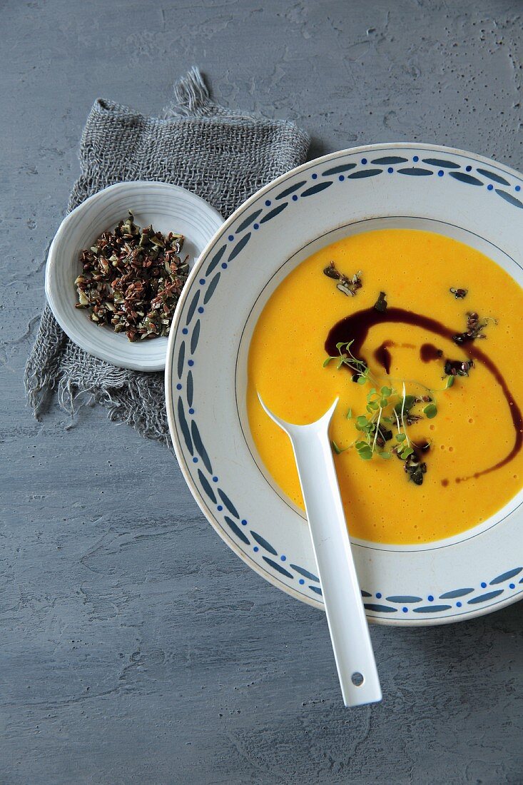 Pumpkin soup with crunchies and pumpkin seed oil