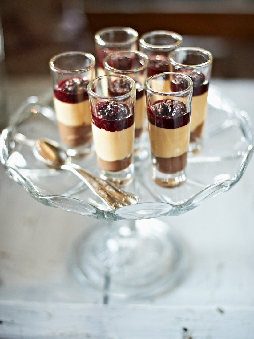 Chocolate desserts with caramel and raspberry compote