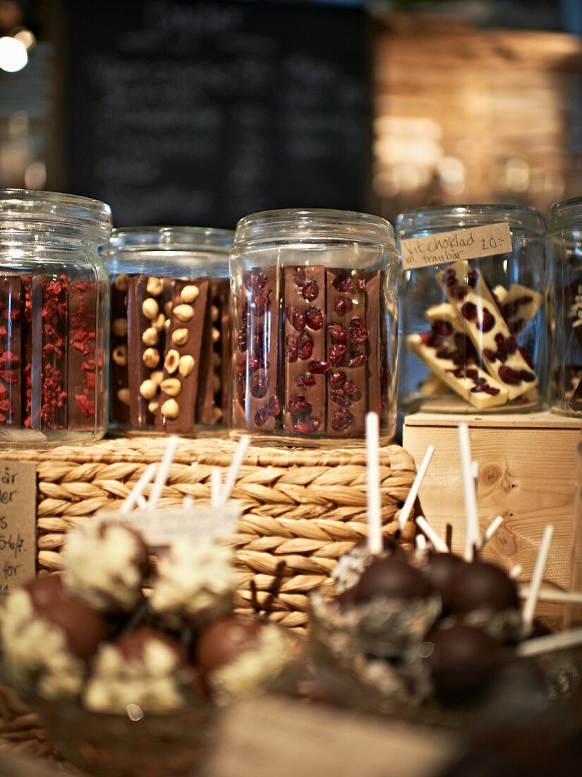 Various chocolate stars in storage jars