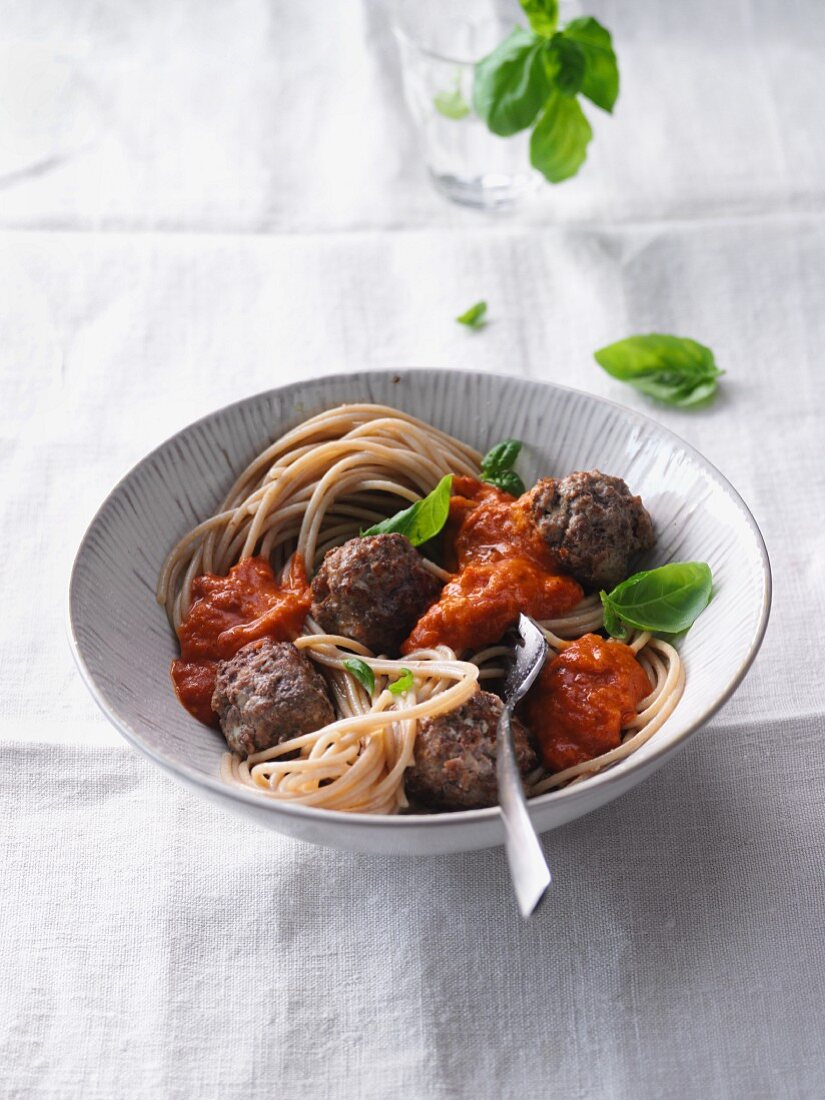 Pasta with feta cheese meatballs and oven-roasted tomato sauce