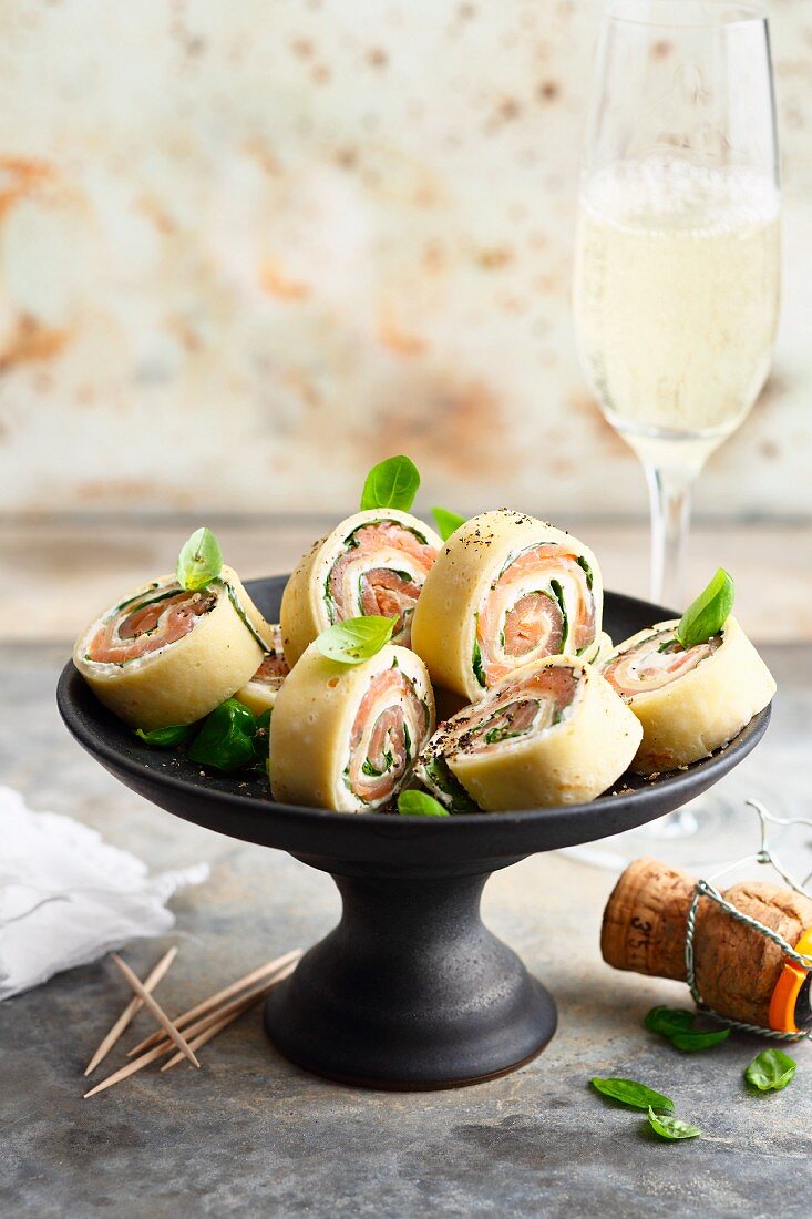 Crepe rolls with smoked salmon and cream cheese