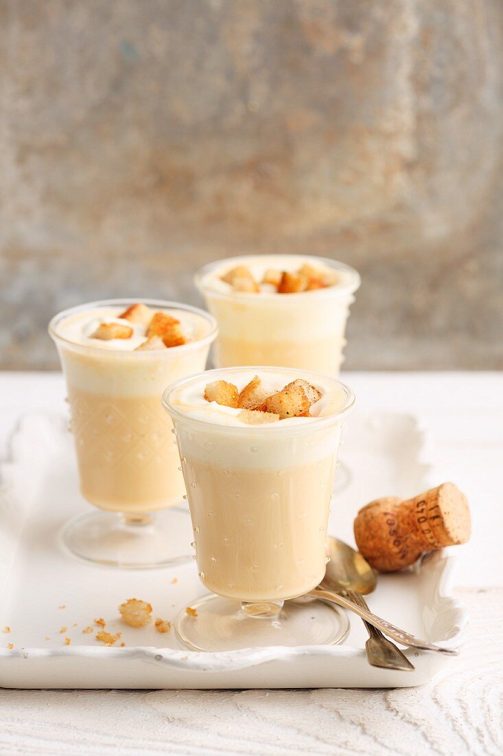 Sparkling Prosecco foam soup with croutons