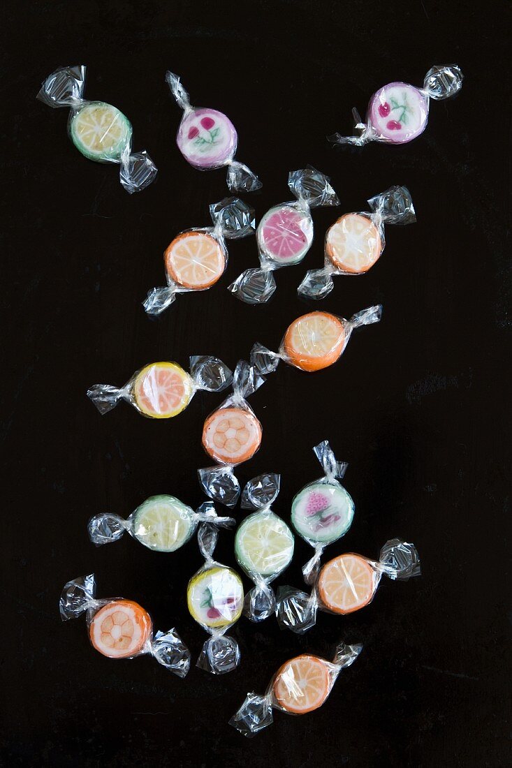 Various bonbons wrapped in cellophane (seen above)
