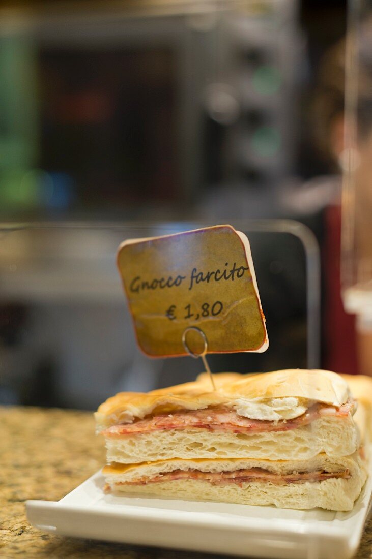 Gnocco farcito (an Italian sandwich) in a bar