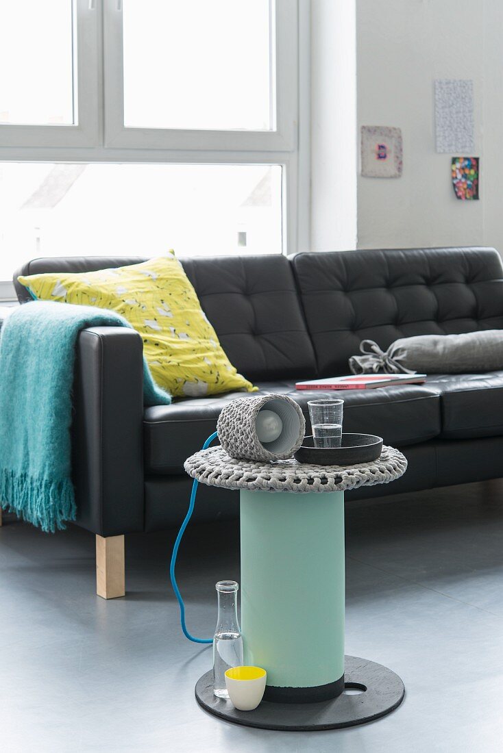 A homemade coffee table made from a cable reel