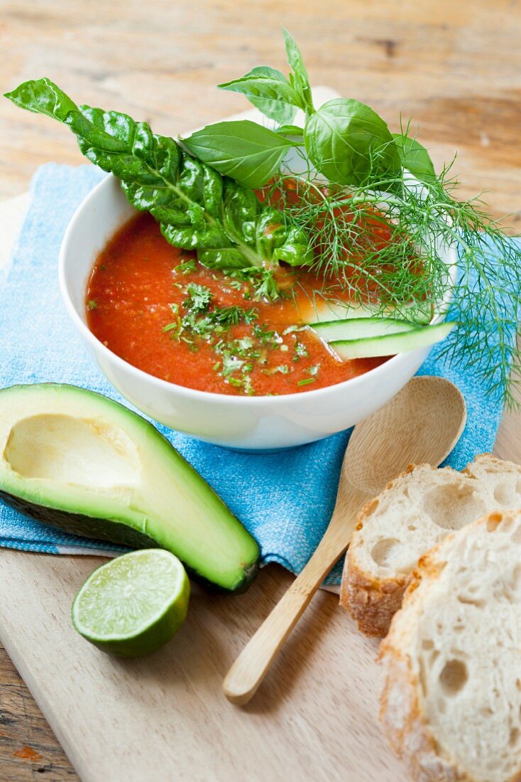 Gazpacho with herbs and avocado served with white bread