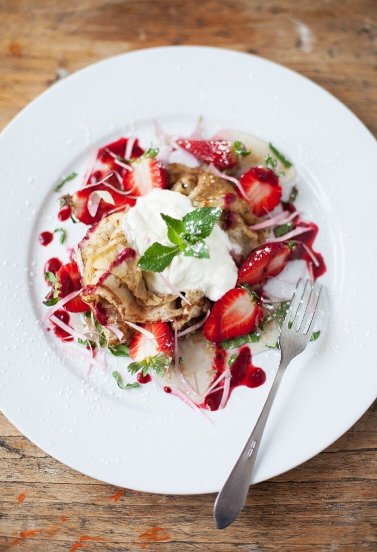 Lavender pancakes with rose jam, strawberries, Greek yoghurt and mint