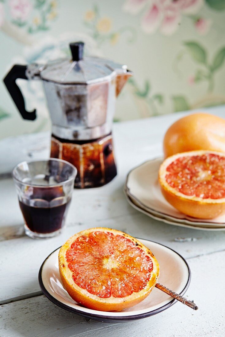 Grapefruit with a caramel crust served with espresso