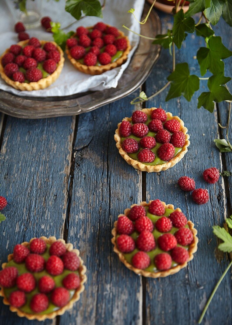 Raspberry tartlets with matcha cream