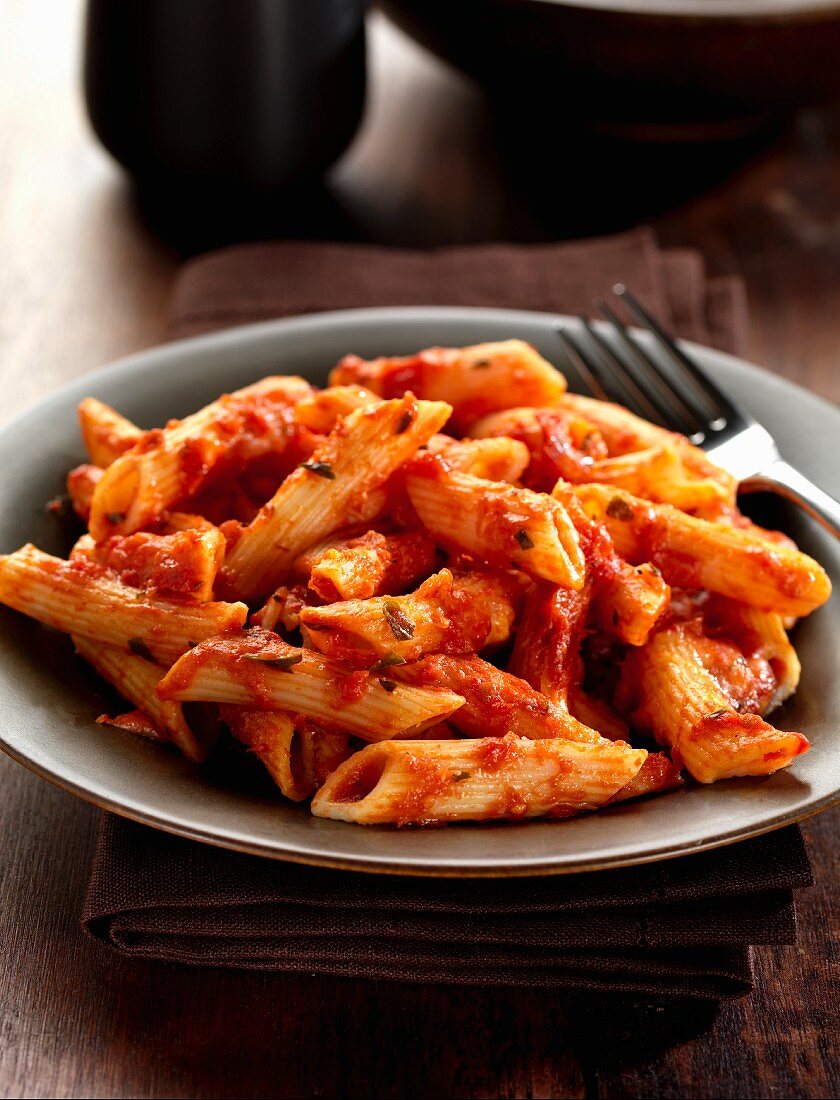 Pasta alla sorrentina (pasta with a cheese and tomato sauce, Italy)