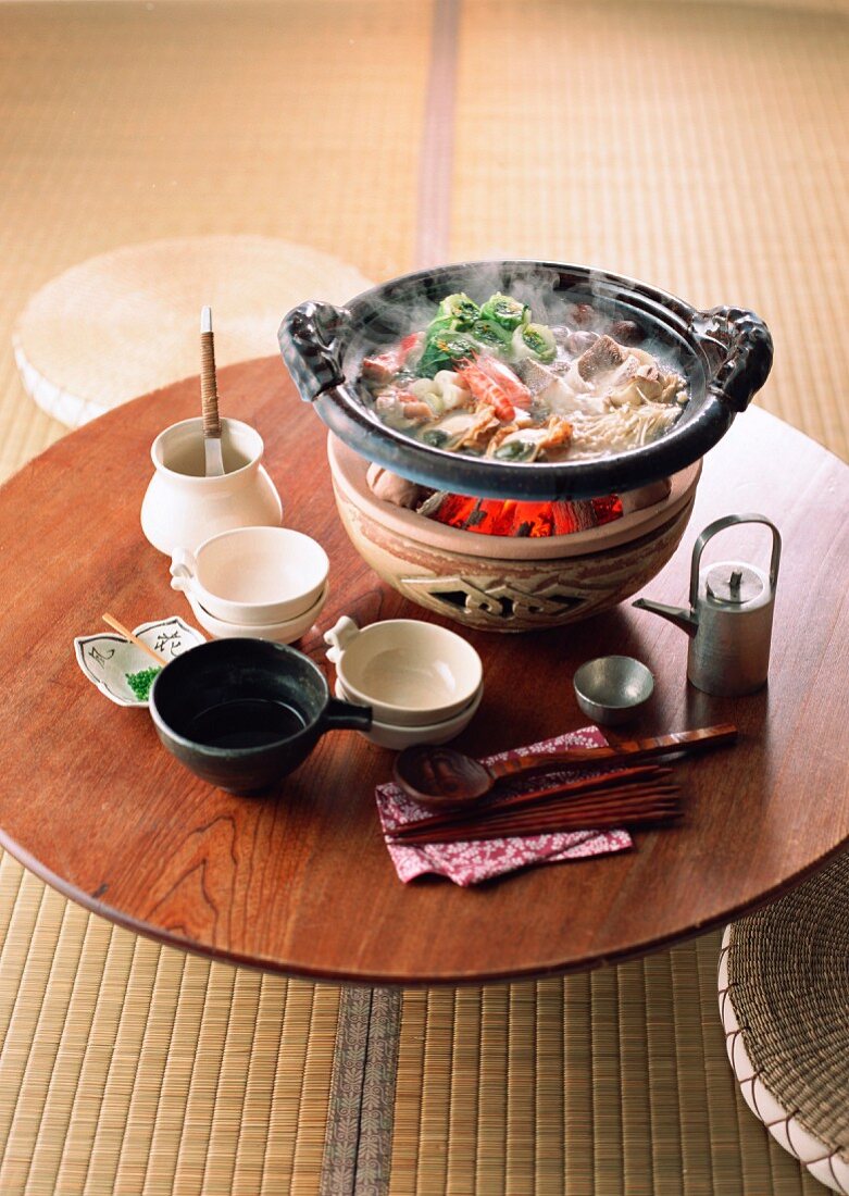 A table laid with Nabemono (Japanese stew)