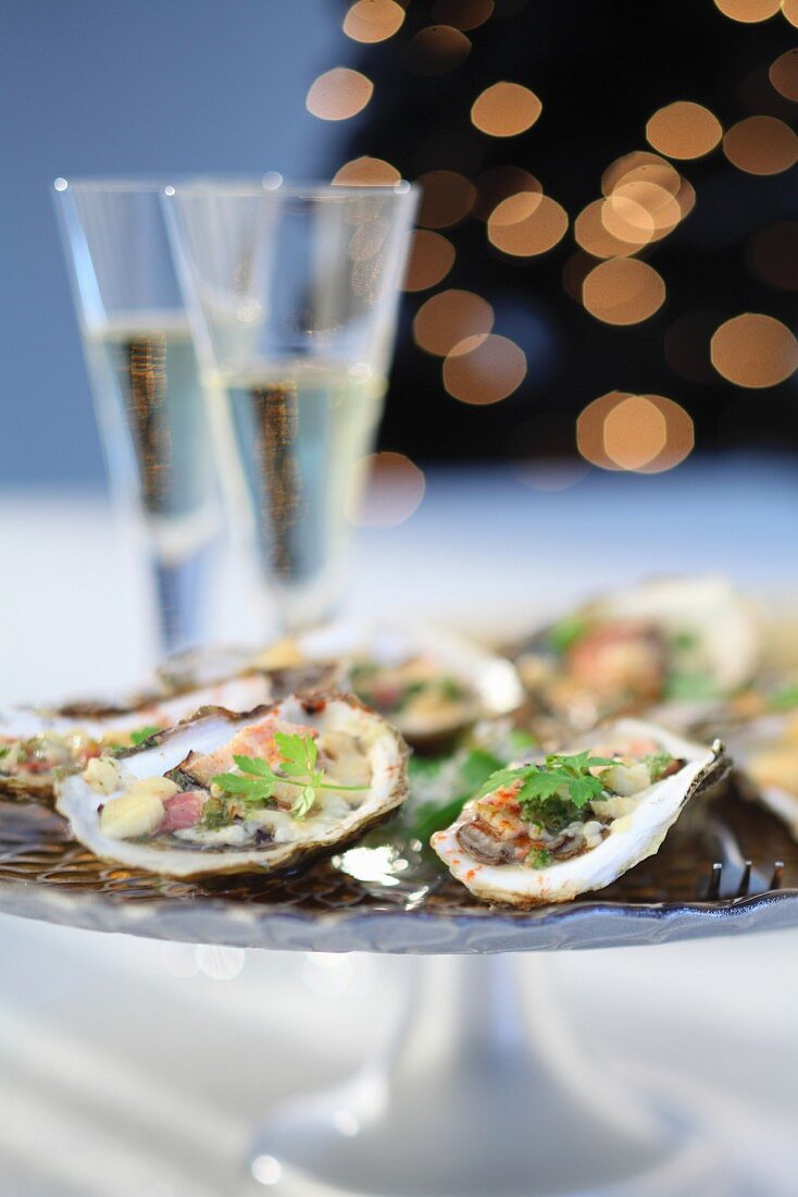 Oysters on a festive platter served with champagne