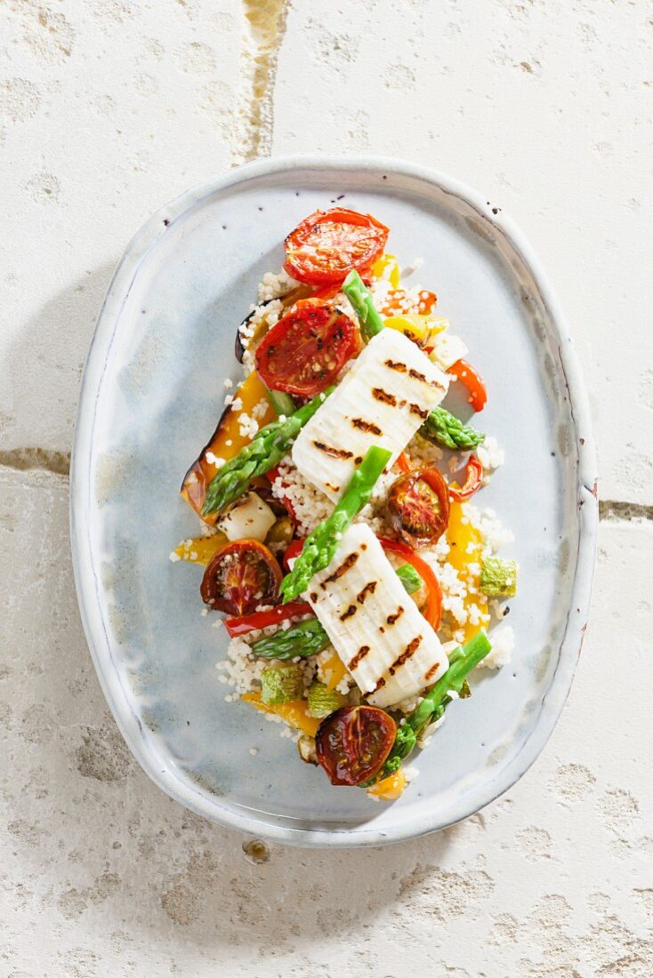 Couscous salad with antipasti and grilled haloumi
