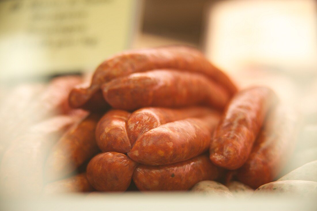 Raw sausages in a butcher's