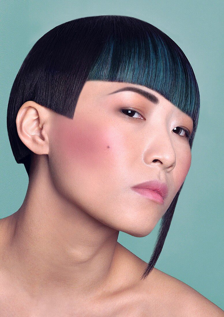 An oriental woman with an unusual asymmetric hairstyle