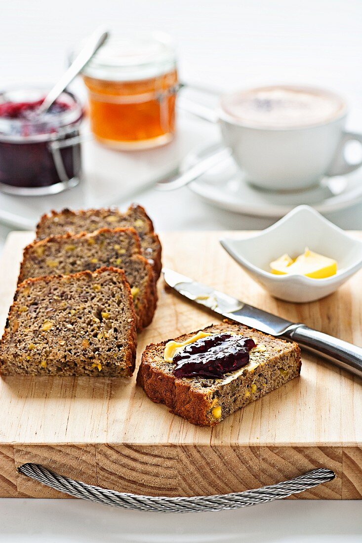 Banana bread with butter and jam