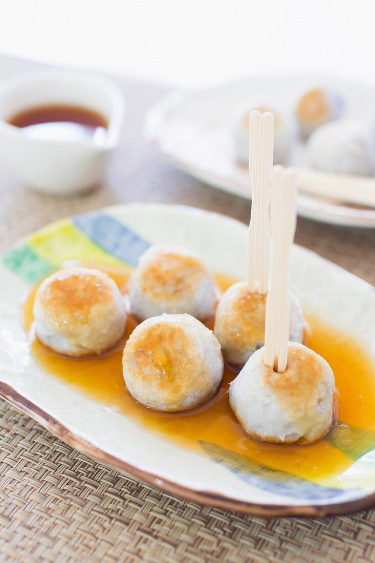 Taro dumplings with a sweet soy glaze