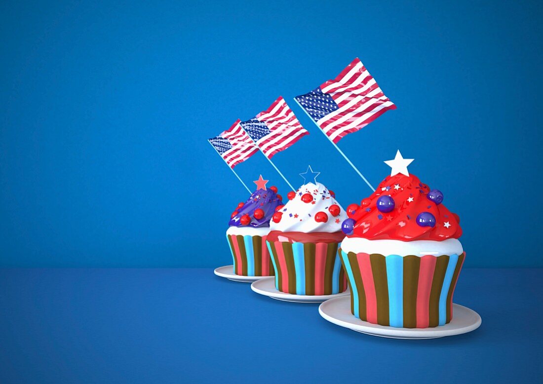 Drei Cupcakes dekoriert mit USA-Flaggen vor blauem Hintergrund (Illustration)