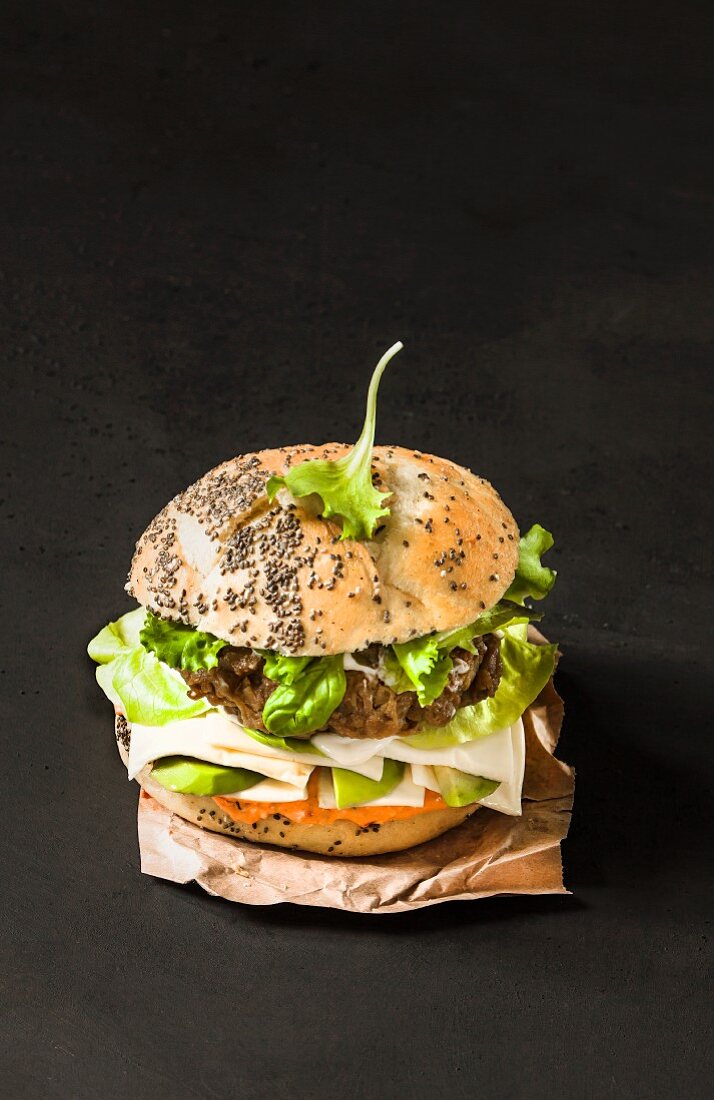 A vegetarian burger with a seitan patty and chia seeds