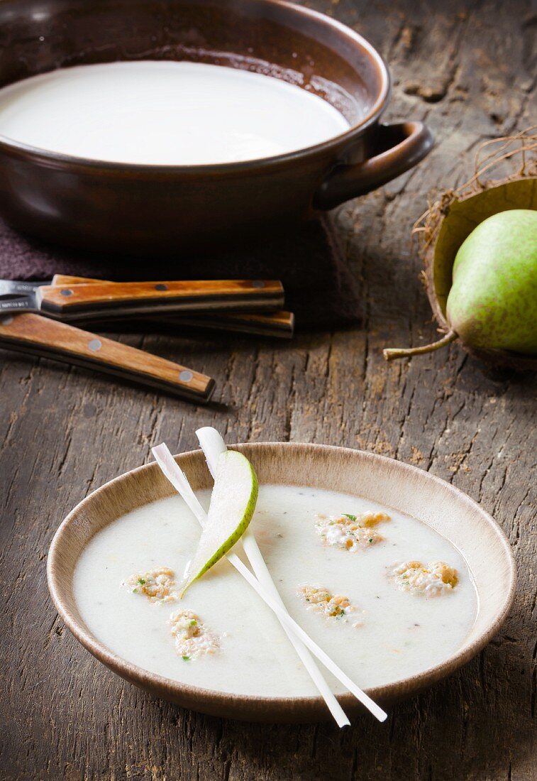 Coconut and pear soup with prawn dumplings