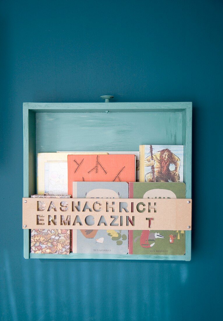 Upcycling: old drawer repurposed as bookshelf