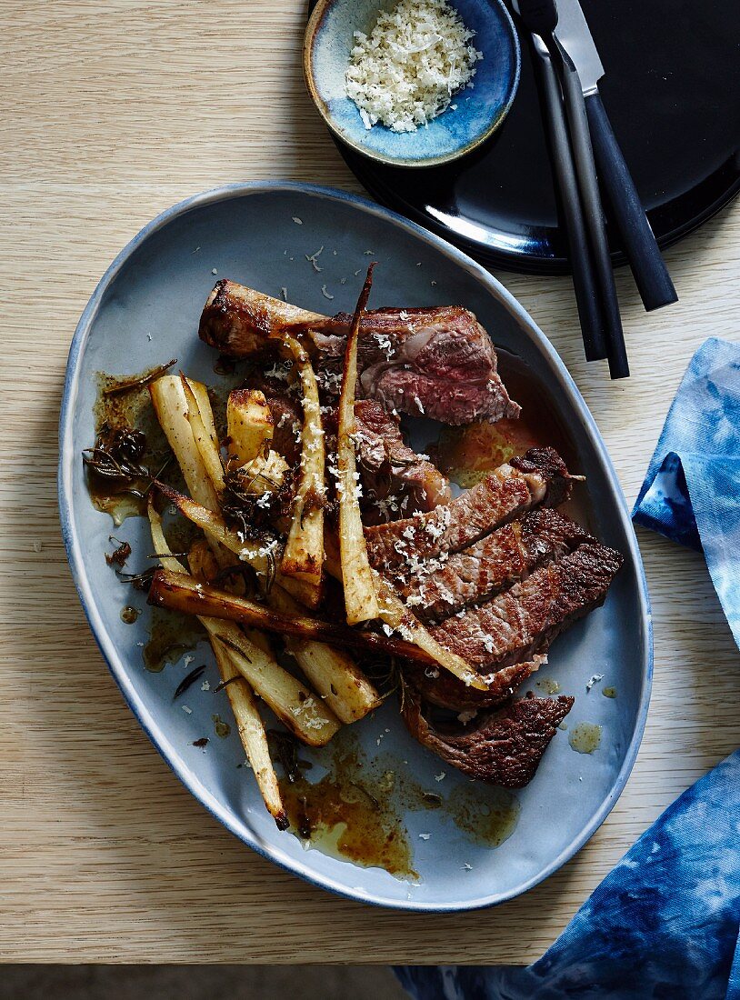 Ribeye steak with roasted parsnips, anchovies and horseradish