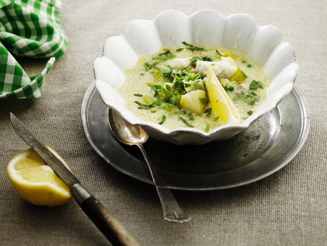 Fish soup with chives and lemon