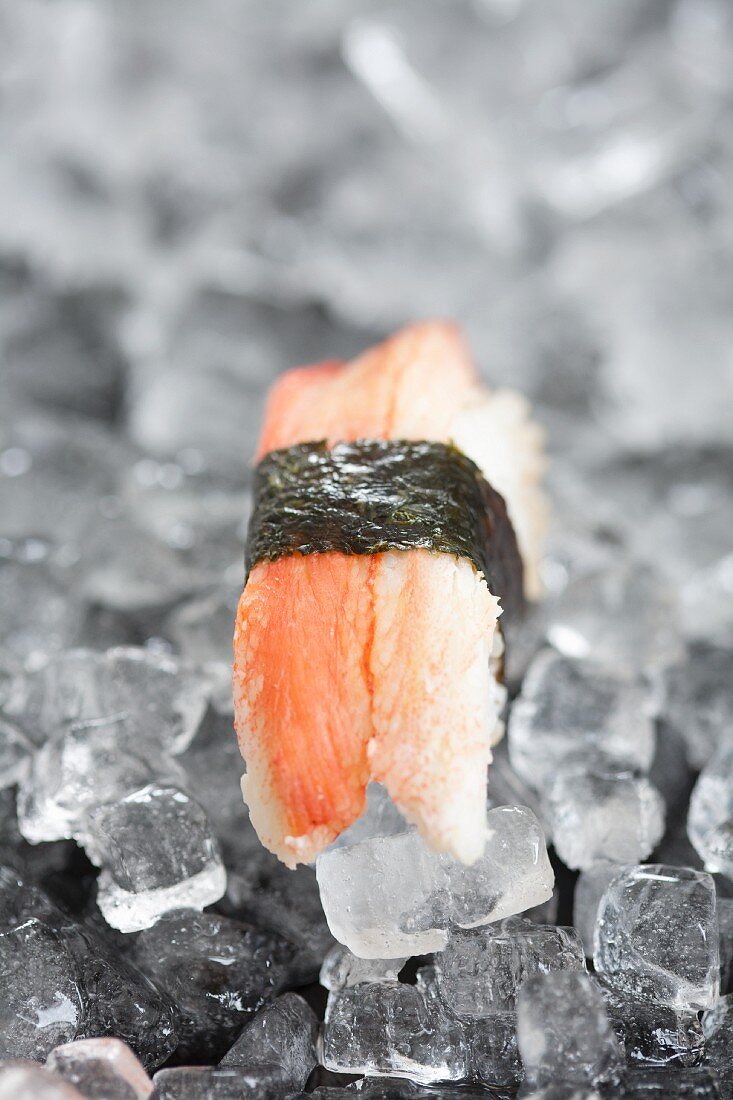 Nigiri sushi with crab on ice
