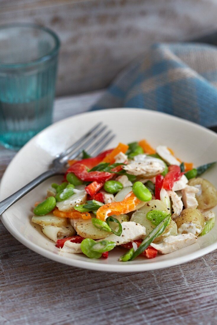 Potato salad with chicken and peppers
