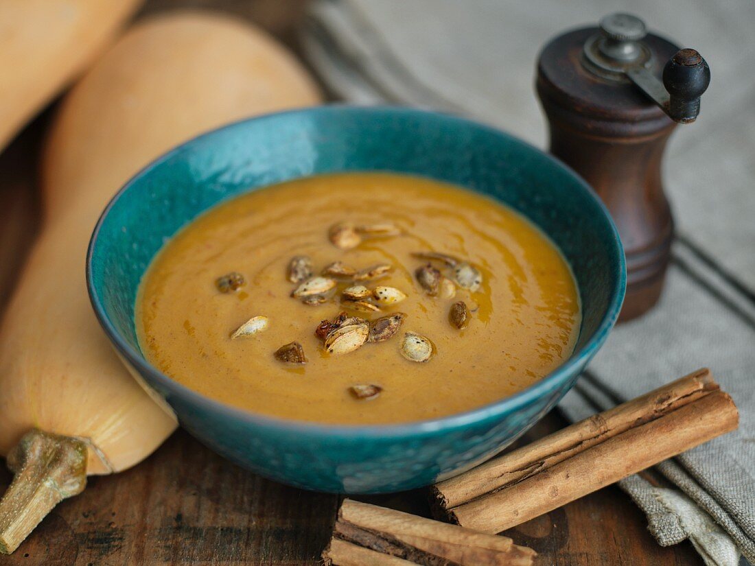 Butternut squash soup with cinnamon and pumpkin seeds