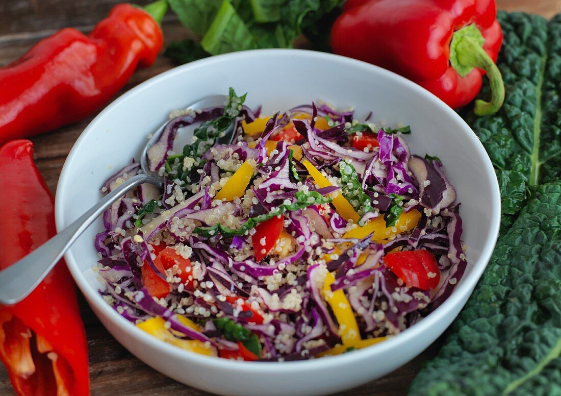 Kale salad with red cabbage, savoy cabbage and pepper