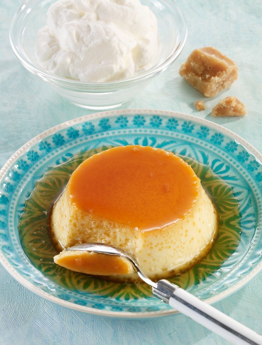 Flan with caramel sauce and whipped cream