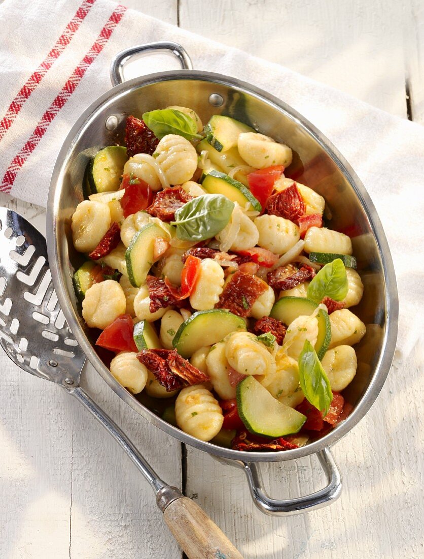 Vegetarian summer gnocchi with courgettes