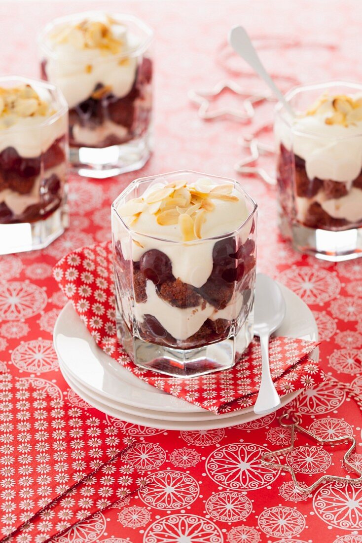 Mini trifles with cherries and flaked almonds for Christmas