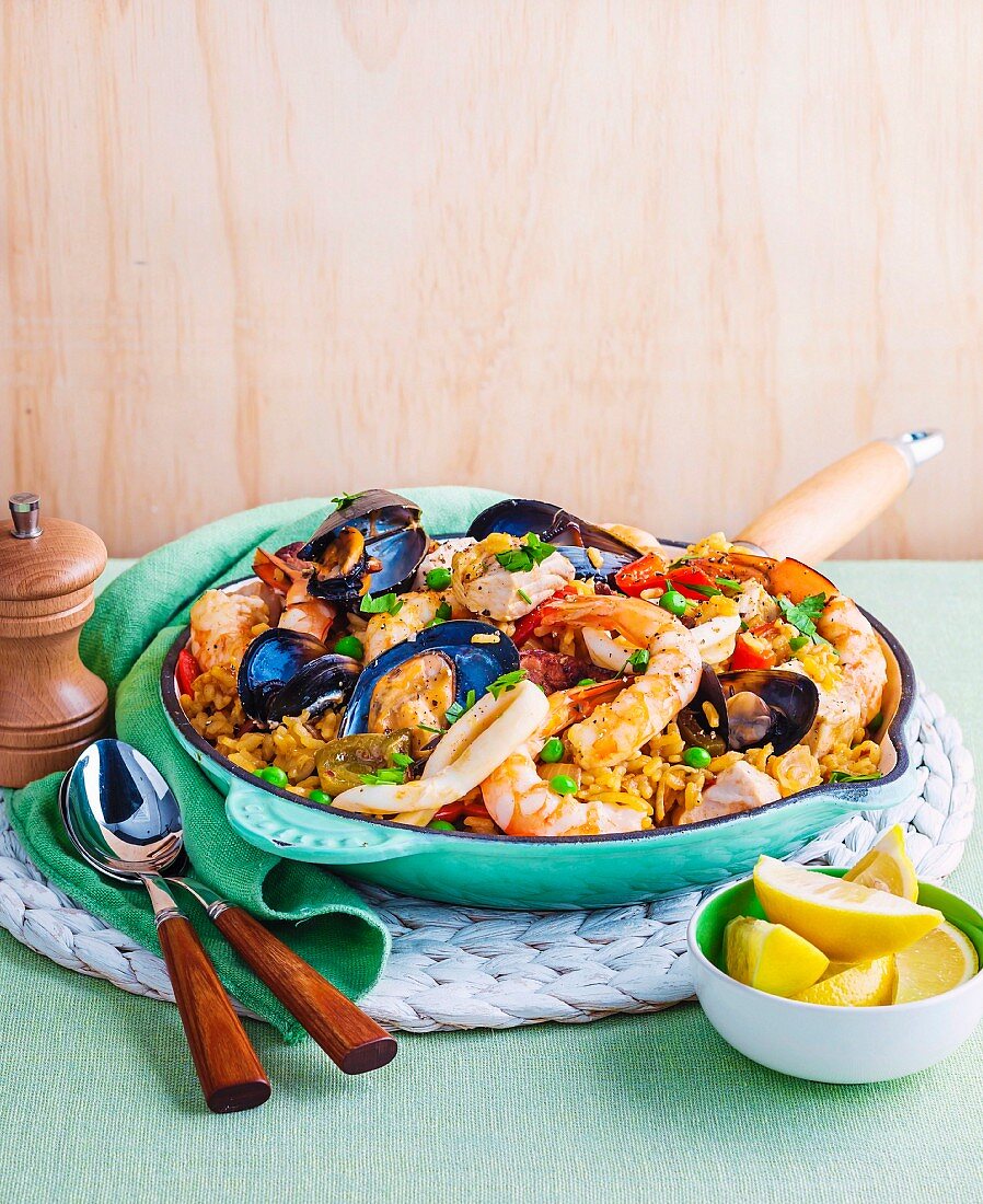 Paella with mussels, squid, prawns & fish